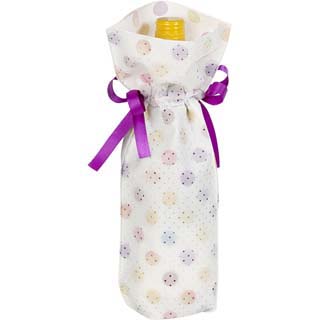 Non woven polypropylene gift bag white/multicolour dot design with purple satin ribbon drawstring and gifttag