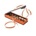 Rectangular brown and orange sweet box with separation insert and magnetic lid 23x7.5x3.3 cm