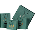 Bag paper MERRY CHRISTMAS green/copper hot foil stamping Christmas trees green cord handles eyelet